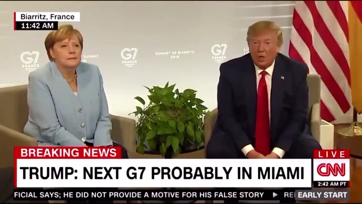 La risa de Merkel ante la frase de Trump - Fuente: CNN