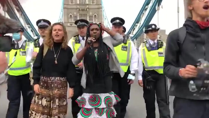 Extinction Rebellion protesters block Tower Bridge