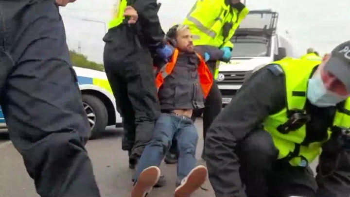 Insulate Britain protesters glue themselves to M25 at junction 31 