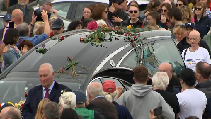Mourners gather for Sinead O'Connor's funeral procession in Bray
