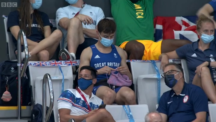 Tom Daley seen knitting during Olympic springboard final