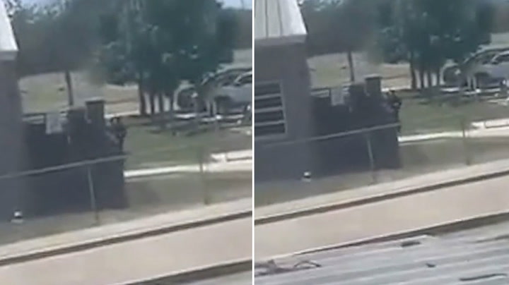 Texas school shooting: Video appears to show gunman walking around school grounds armed with rifle
