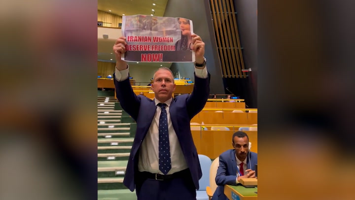 Israeli ambassador holds up photo of Mahsa Amini during Iranian president's UN speech
