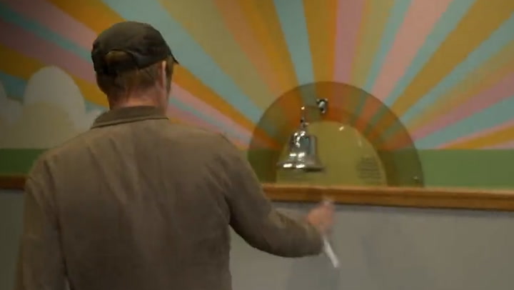 Emotional moment Rhod Gilbert 'rings the bell' after finishing cancer treatment