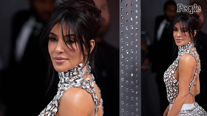 Kim Kardashian Dazzles in Crystal Top and Skirt at Swarovski Opening