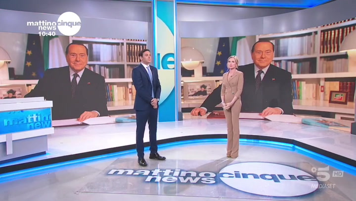 Italian news presenter holds back tears as she announces Berlusconi's death