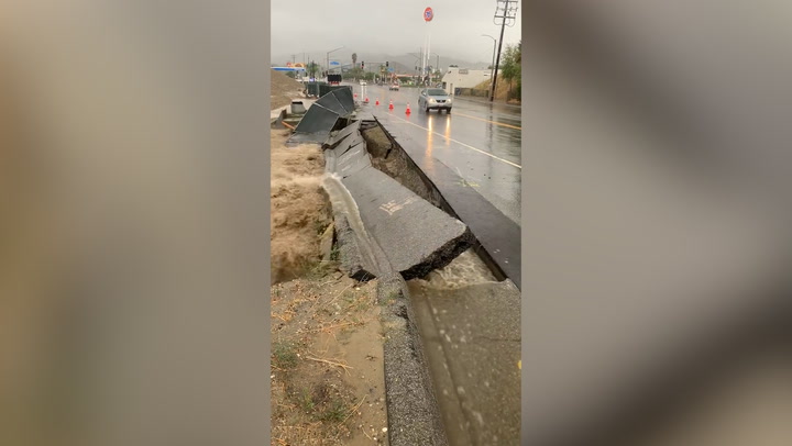 Tropical Storm Hilary crumbles road in California as heavy rain hits state