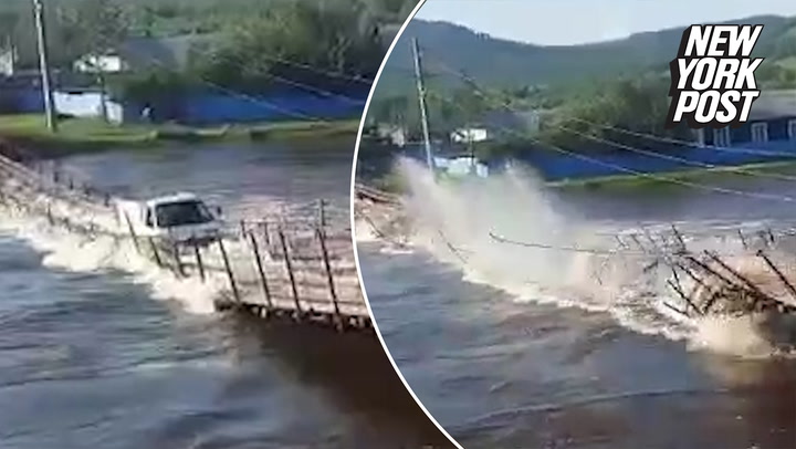 Van plunges into water after bridge collapses in Russia