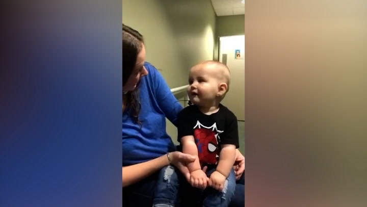 Deaf nine-month-old baby hears his parents for first time after surgery
