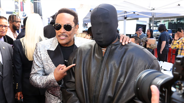 Kanye West wears bizarre full-face black mask during surprise Hollywood Walk of Fame appearance