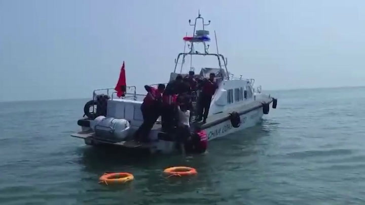 Rescuers save drunk man, 50, who fell into the sea in China