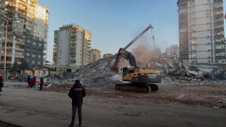 Bulldozers clear rubble in Turkish cities after deadly earthquake