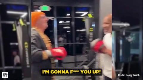 Mike Tyson Lose His Cool When A Fan Accidentally Lands A Punch