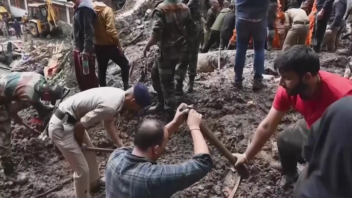 India: Rescuers search for missing locals after deadly landslides