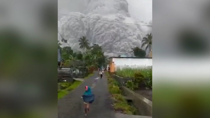 Mount Semeru: Ash erupts '40,000ft into sky' from Indonesian volcano as locals run for lives