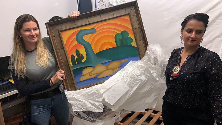 Watch the moment Brazilian police found a hidden stash of stolen paintings worth millions