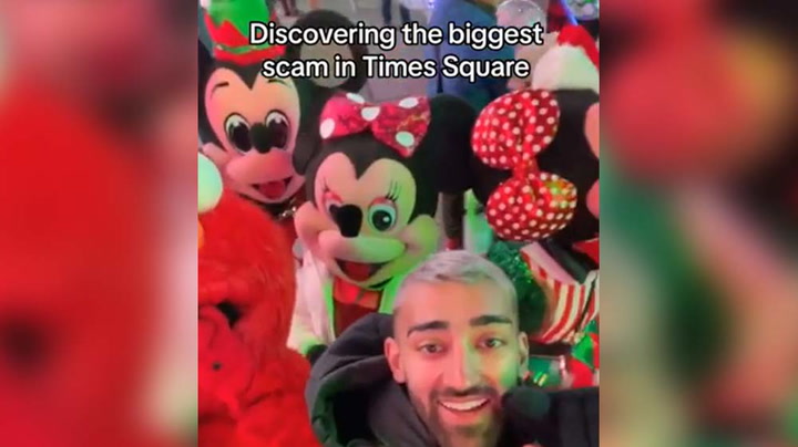 Tourist chased away by furious Times Square characters for exposing 'biggest scam': 'Free photos!'