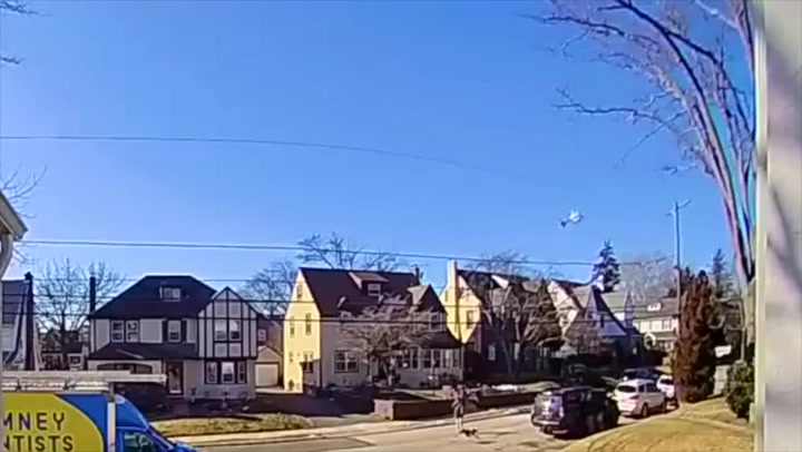 Doorbell cam captures moment helicopter splutters across Philadelphia sky before crash