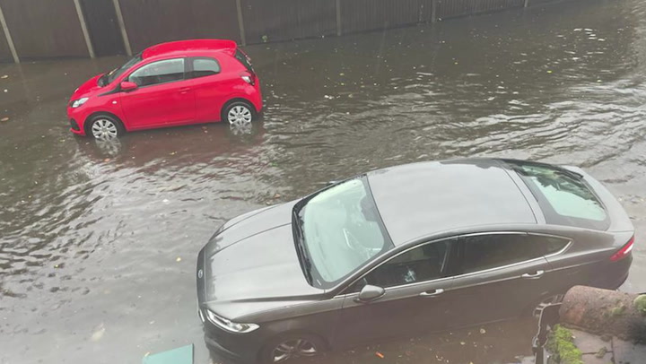 Roads in London submerged by flooding as Met Office issues another warning