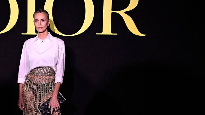 Charlize Theron Wears Custom Louis Vuitton Headband — Exclusive