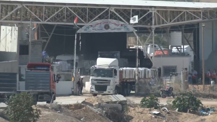 Aid trucks pass through Rafah border crossing