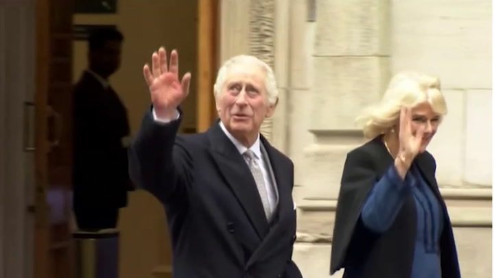 King Charles smiles as he leaves hospital following prostate procedure