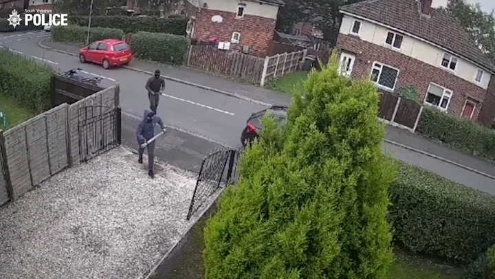 Baseball bat-wielding quad bike riders violently attack family's home and car