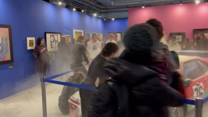 Climate activists throw flour at Warhol car in Milan
