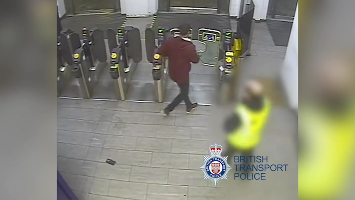 Moment man punches rail worker who challenged him for fare evasion