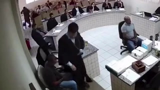 Moment son shoots father’s accused killer in middle of courtroom