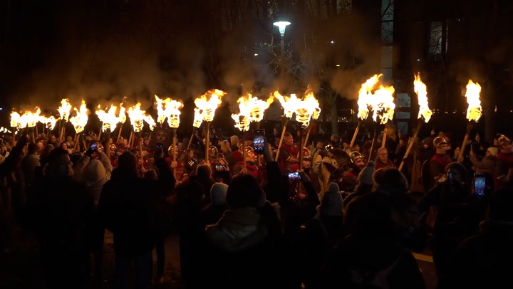 Thousands of torches light Edinburgh streets kicking off Hogmanay celebrations
