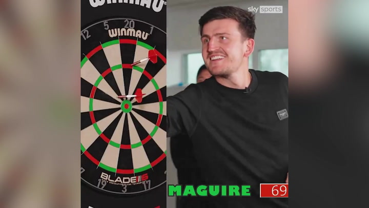 Man United star Harry Maguire impresses in darts challenge against Luke Littler