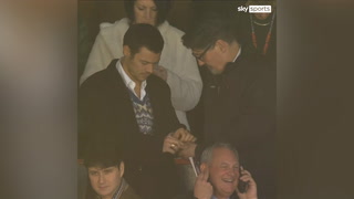 Harry Styles shares mints with Mick Harford at Luton Town v Man United
