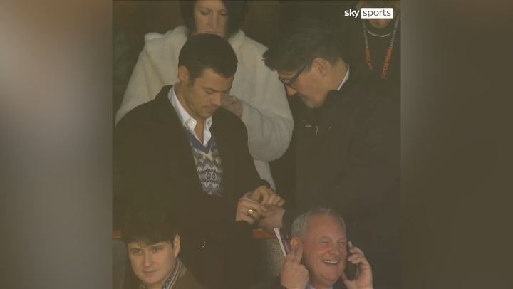 Harry Styles shares mints with Mick Harford in stands at Luton Town vs Man United