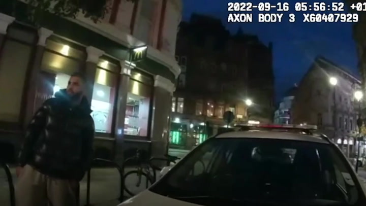 Moment police tackle man armed with knife before he stabs officers