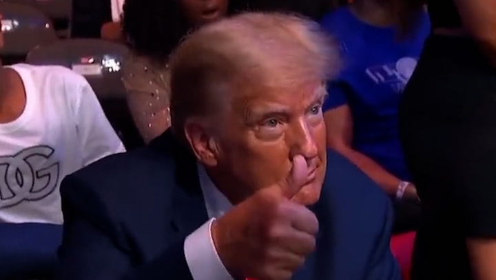 Crowd erupts as Donald Trump sits in front row at UFC 287 in Miami