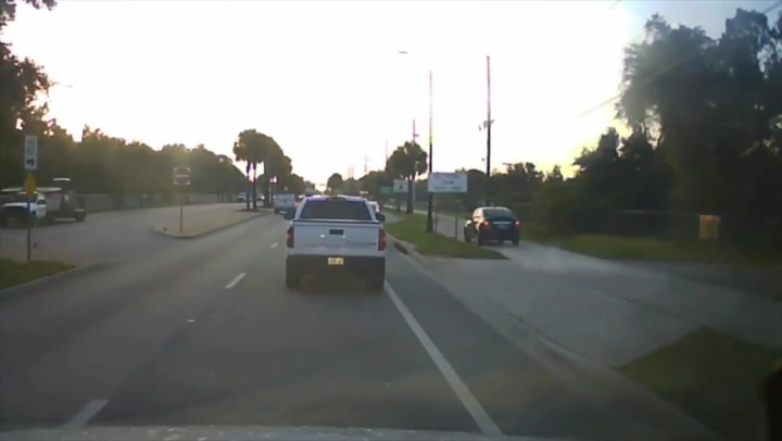 Florida driver mounts pavement to avoid rush hour traffic