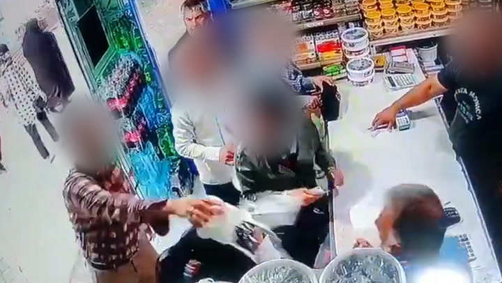 Moment man attacks Iranian women with yoghurt for not wearing hijabs
