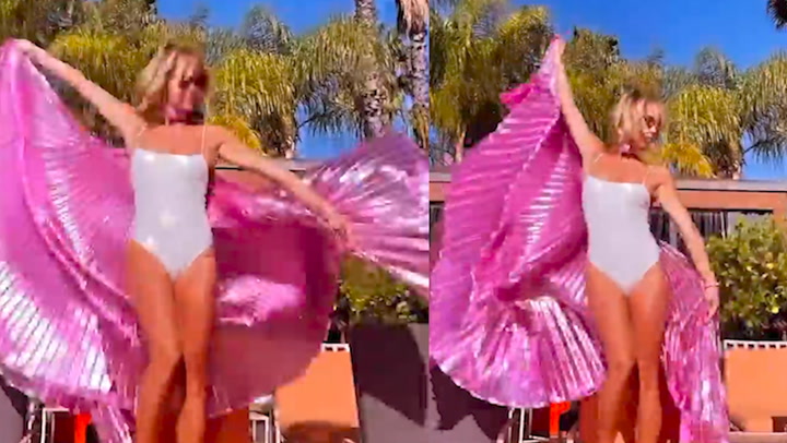 Amanda Holden shows off her incredible figure in red hot bikini