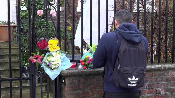 Fans leave flower to late Dame Vivienne Westwood's home
