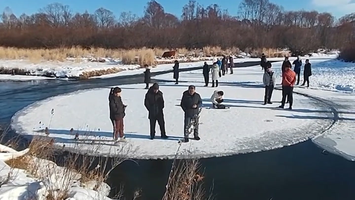 PERFECTLY SHAPED, FLOATING ICE DISK PROVIDES NATURAL PLAYGROUND FOR LOCALS