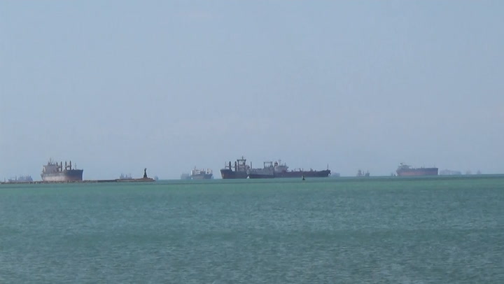 Ships anchored in Suez as cargo ship remains stuck
