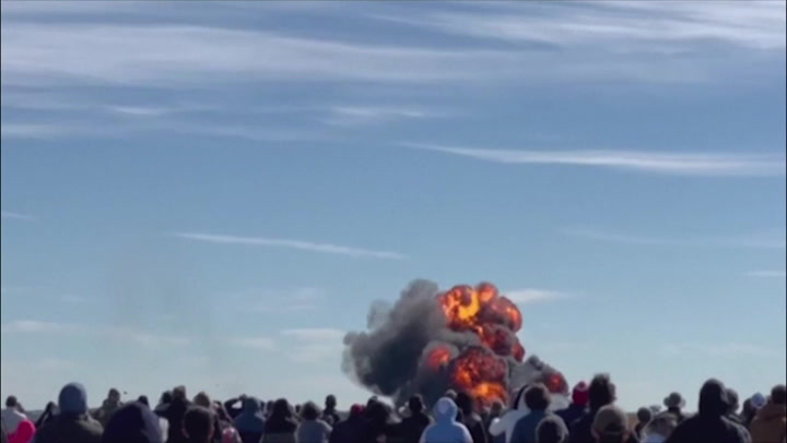 Two World War II aircraft explode after colliding mid-air during Dallas airshow