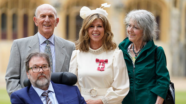 Derek Draper watches as wife Kate Garraway collects MBE from Prince William