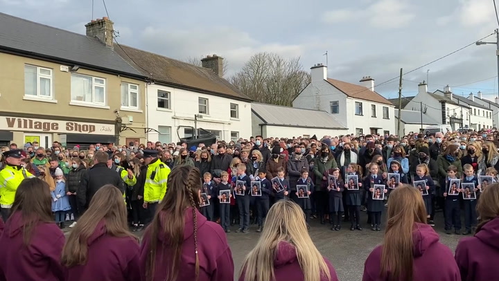 Huge crowds of people line the street for Ashling Murphy's funeral