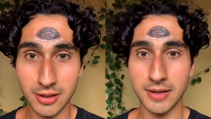 Man gets huge eye tattooed on forehead because he was 'fed up of living in  fear' - Daily Star