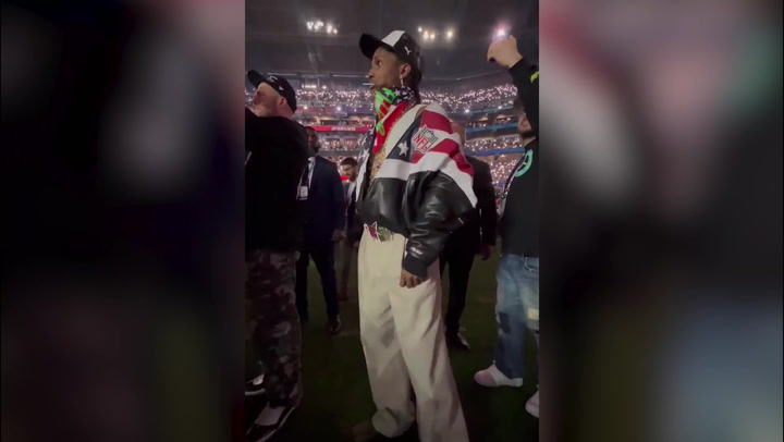 ASAP Rocky watches pregnant girlfriend Rihanna perform Super Bowl halftime show