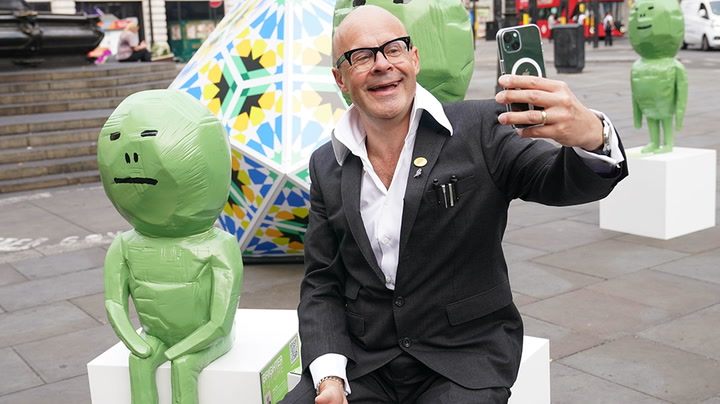 Aliens invade Piccadilly Circus in public art display by comedian Harry Hill