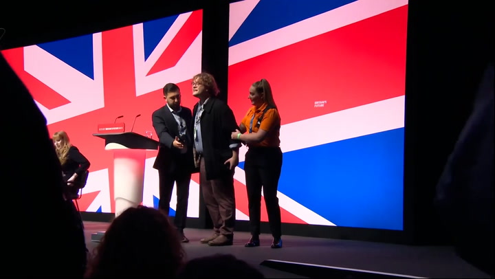 Protestor storms stage ahead of Angela Rayner speech during Labour Party conference