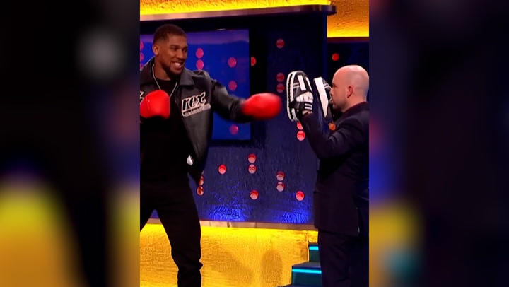 Anthony Joshua sends Tom Allen 'flying' with uppercut